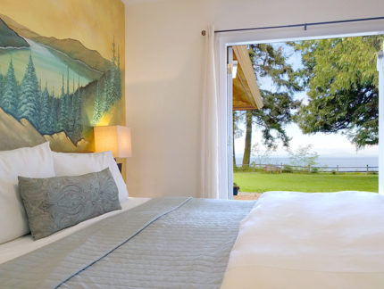 Lake Crescent Suite ith door leading outdoors