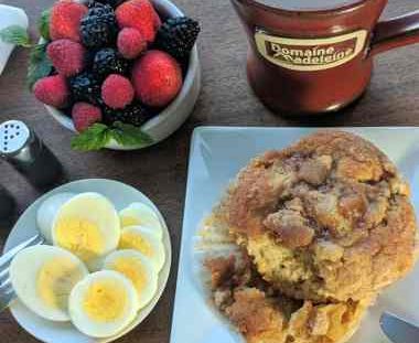 fruit, eggs, muffins and coffee