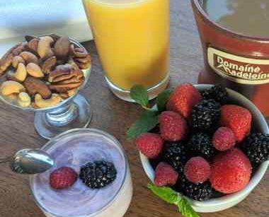 Nuts, fruit, orange juice and coffee