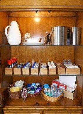 Amenities in wood cabinet