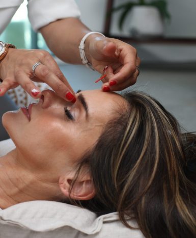 Lady being given a facial
