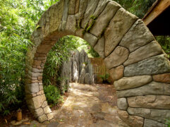 Stone sculpture garden gate